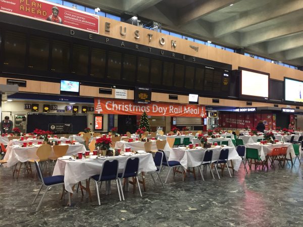 200 homeless people enjoy Christmas Dinner at London Euston Station