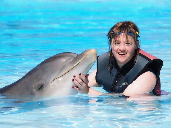 Emma Bishop with a dolphin 