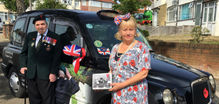 WWII Veteran Harry Rawlins in front of a black cab